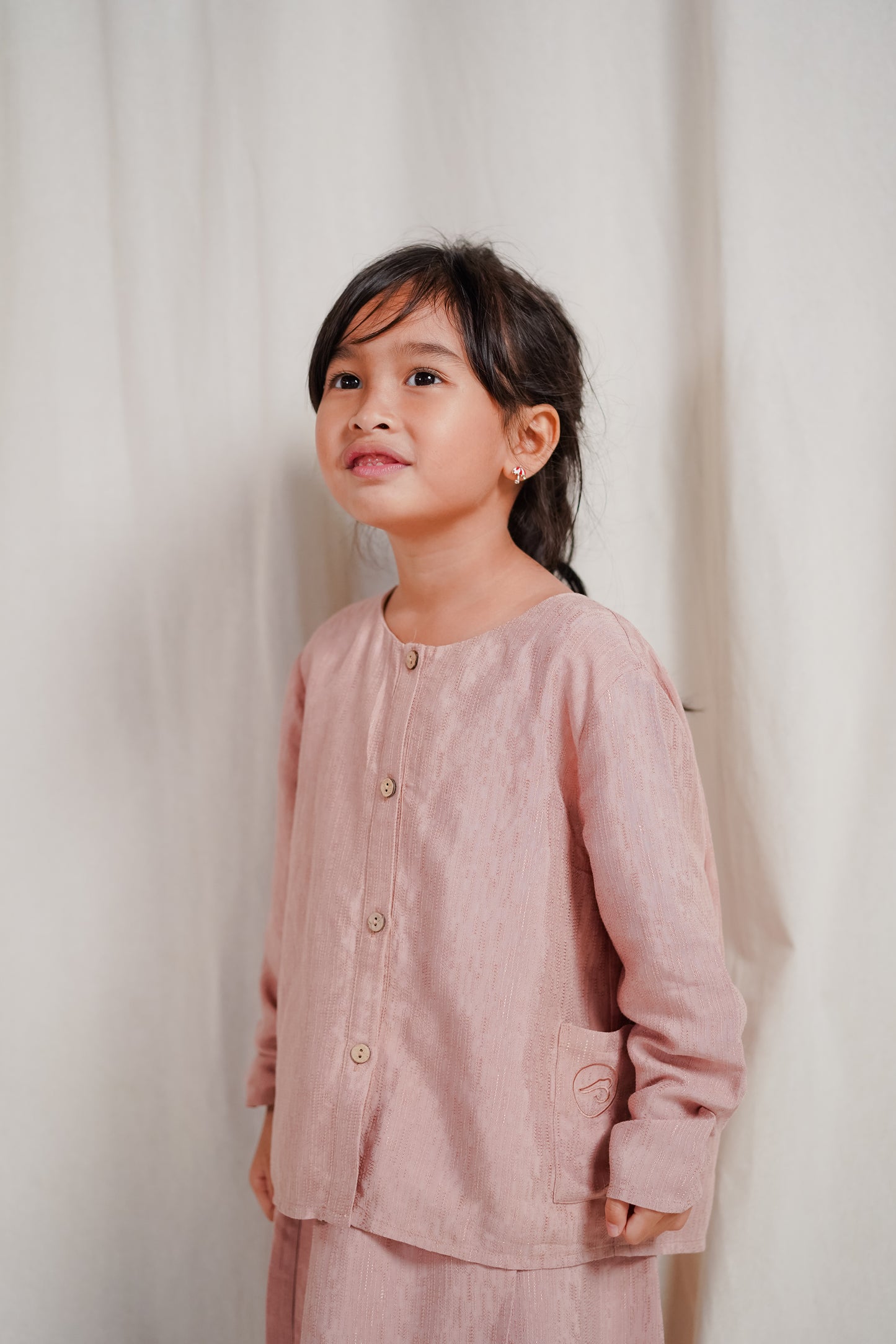 Riang Junior in Coral Haze